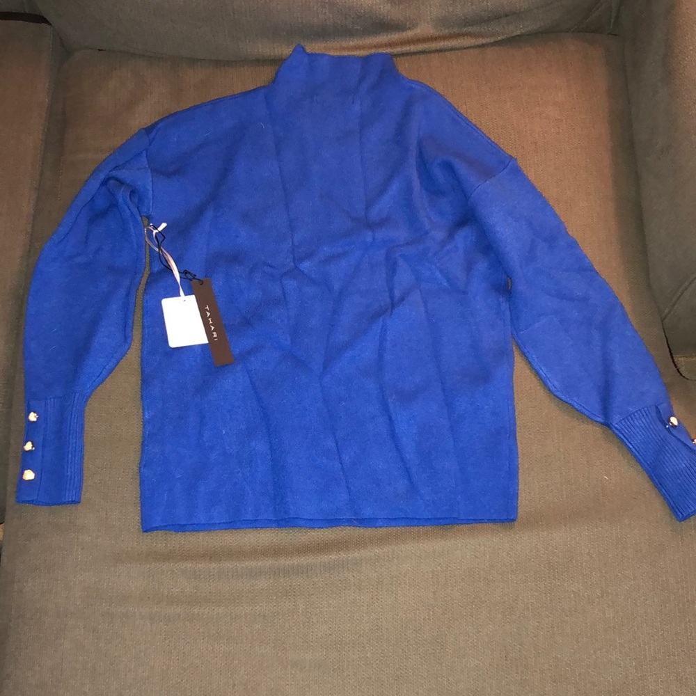 Long sleeve royal blue Turtleneck never worn! Size XS can fit S